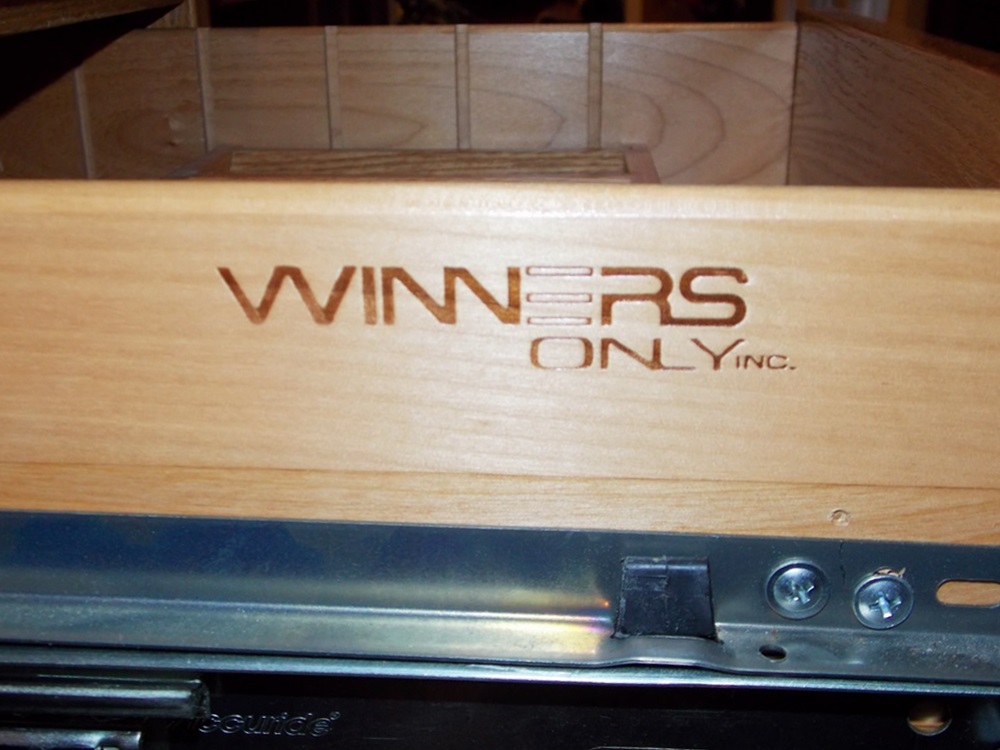 A Solid Oak Roll Top Computer Desk by "Winners Only Inc."