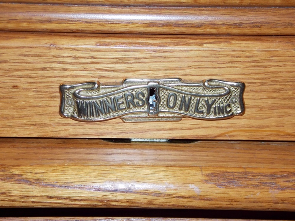 A Solid Oak Roll Top Computer Desk by "Winners Only Inc."