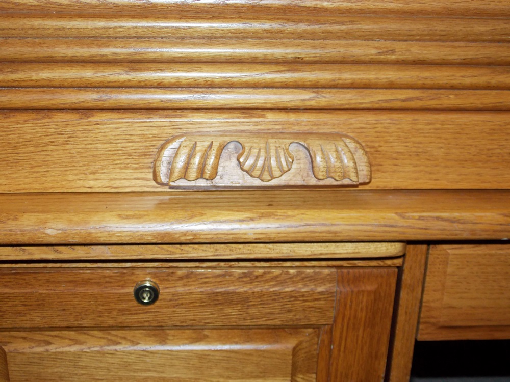 A Solid Oak Roll Top Computer Desk by "Winners Only Inc."