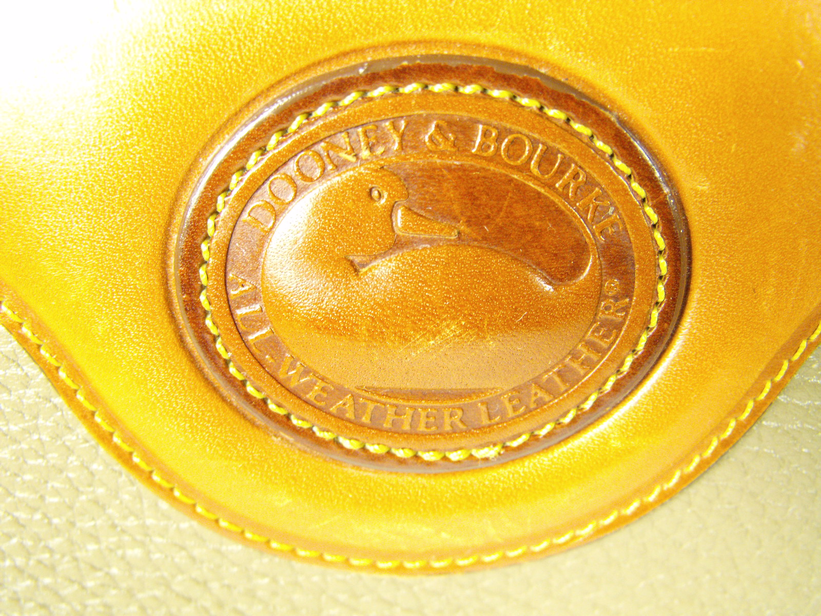 Dooney & Bourke All Weather Leather handbag/cross body purse