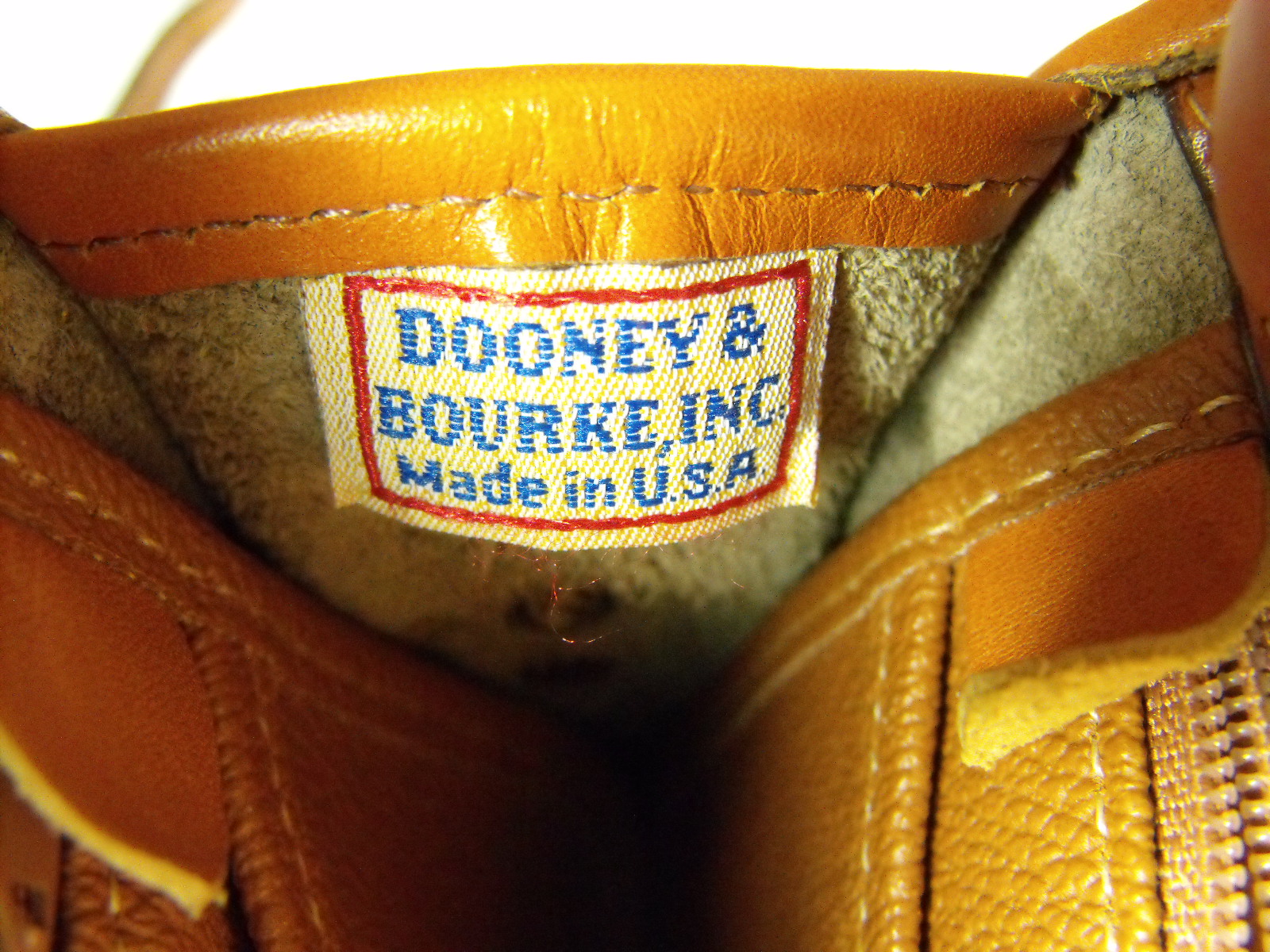 Dooney & Bourke All Weather Leather handbag/cross body purse