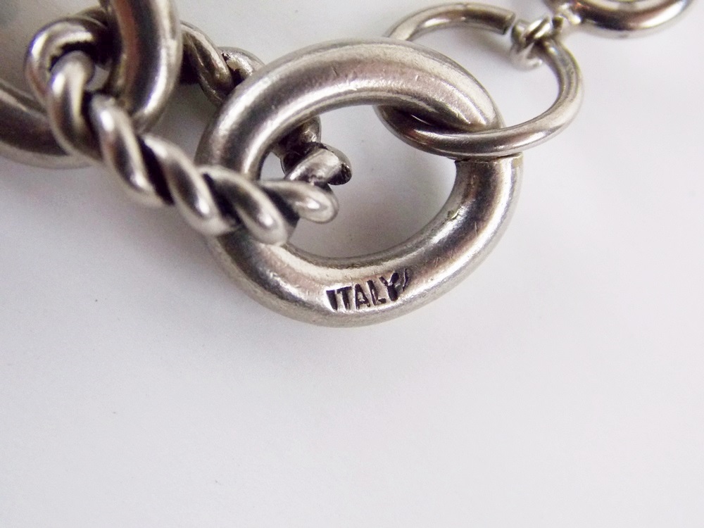 An Awsome Vintage Charm Bracelet with Four Large Charms, Made in Italy