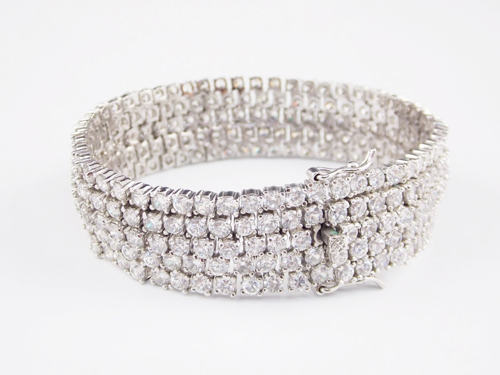 A Stunning Sterling Silver Bracelet, Five Rows Are Encrusted in Rhinestones