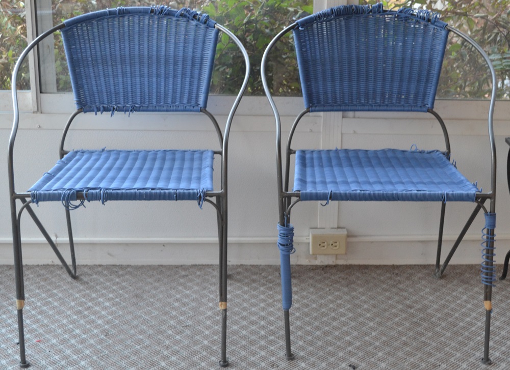 2 Wrought Iron And Wicker Look Chairs