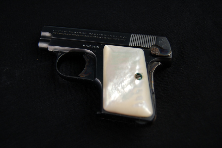 Colt .25 Caliber Pistol with a Mother of Pearl Handle and Holster