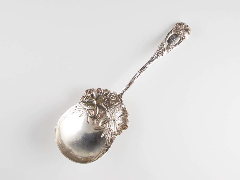 A Rare and Resplendent Antique Sterling Silver Serving Spoon 