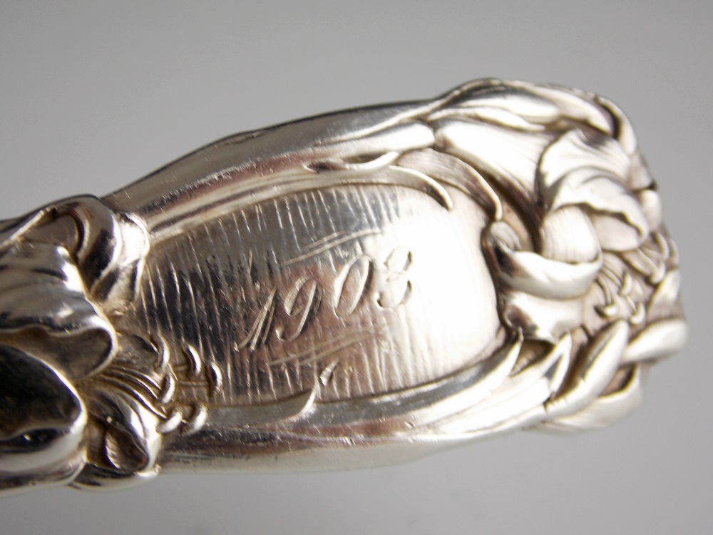 A Rare and Resplendent Antique Sterling Silver Serving Spoon 