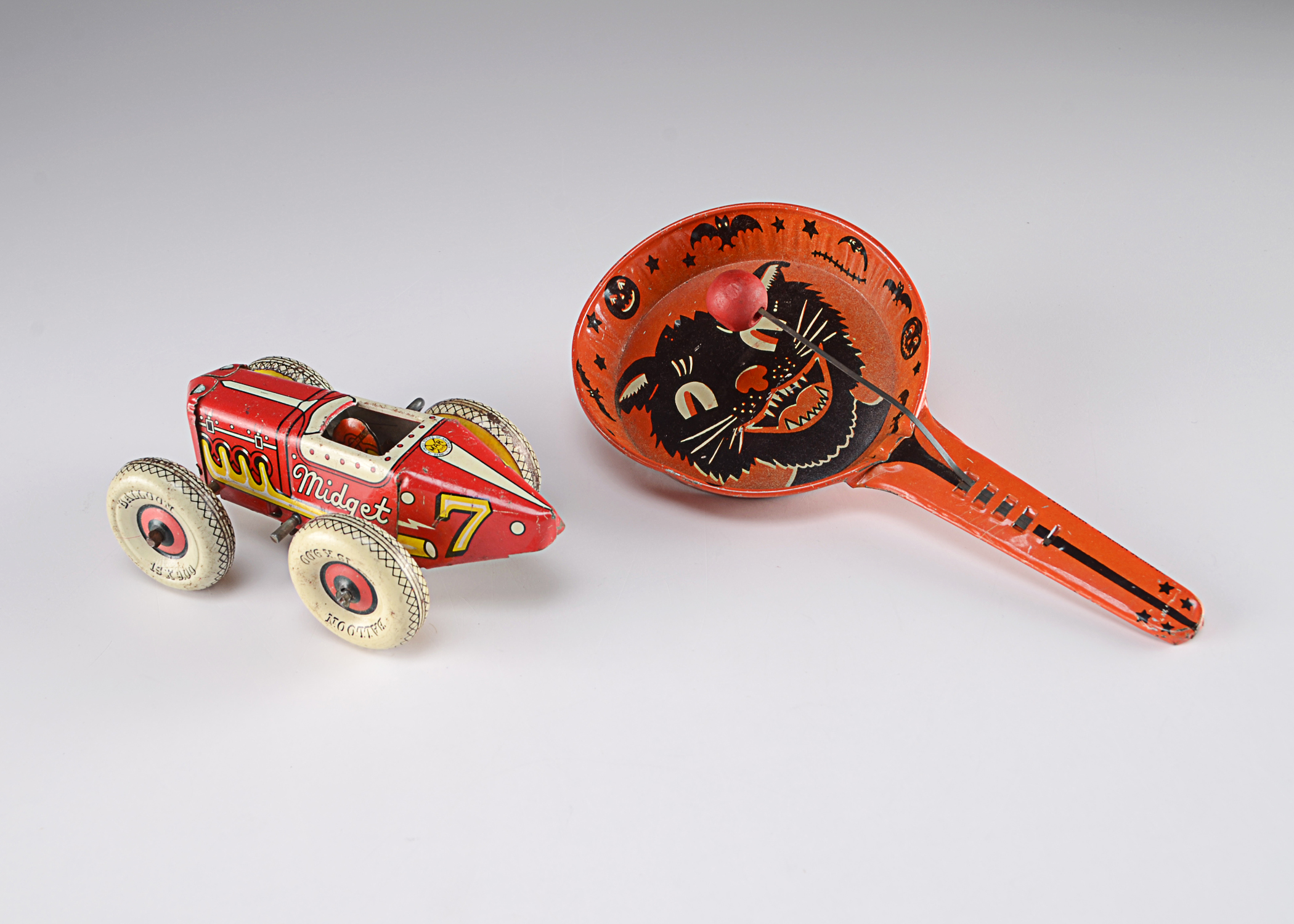 Two Vintage Tin Lithograph Toys, Marx Race Car and Kirchhoff Noise Maker