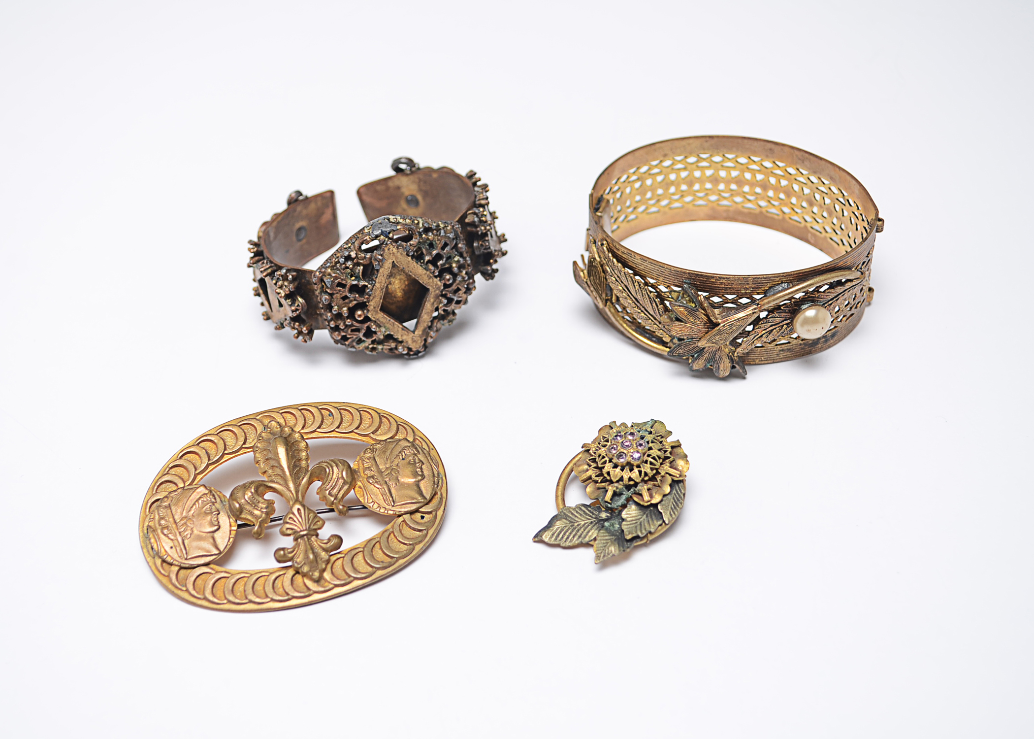 Four Antiqued Gold Vintage Art Deco Jewelry Pieces