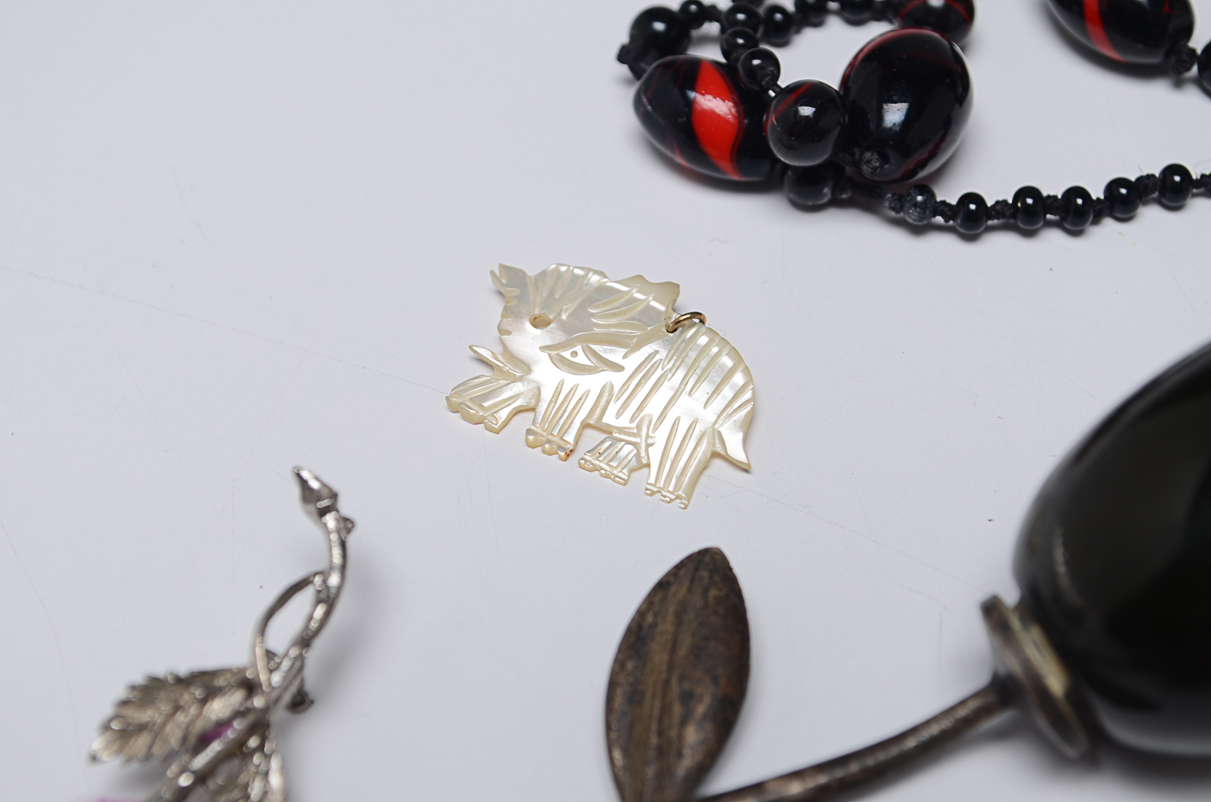 Assortment of Jewelry Items and Three Non-Jewelry Items