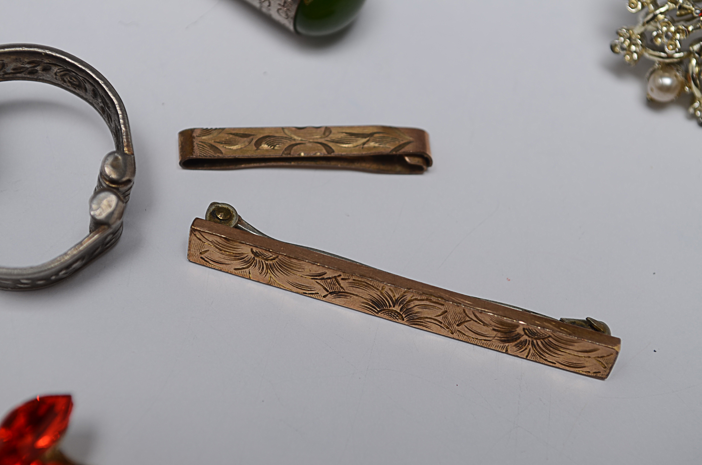 Assortment of Jewelry Items and Three Non-Jewelry Items