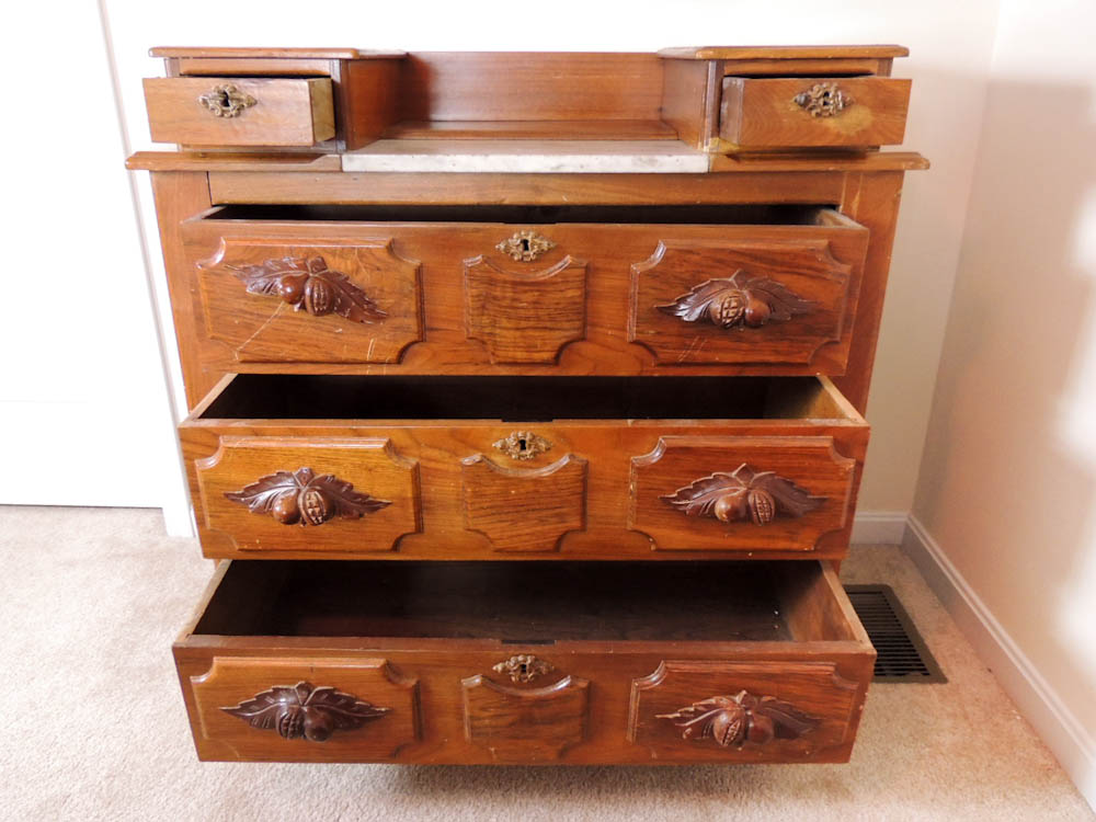 Antique Victorian Drop Center Wood Dresser with Carved Pulls and Marble Top
