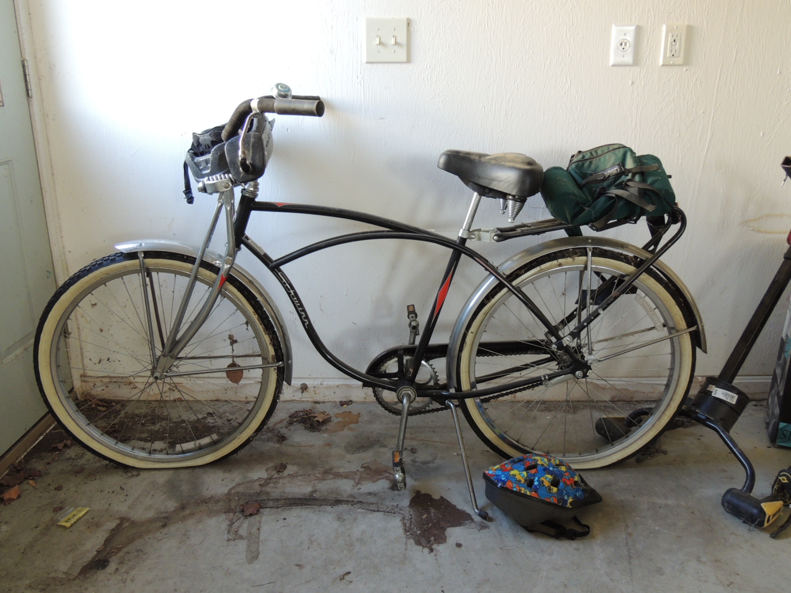Two Cannondale Bicycles, a Schwinn Bicycle and Two Bike Racks