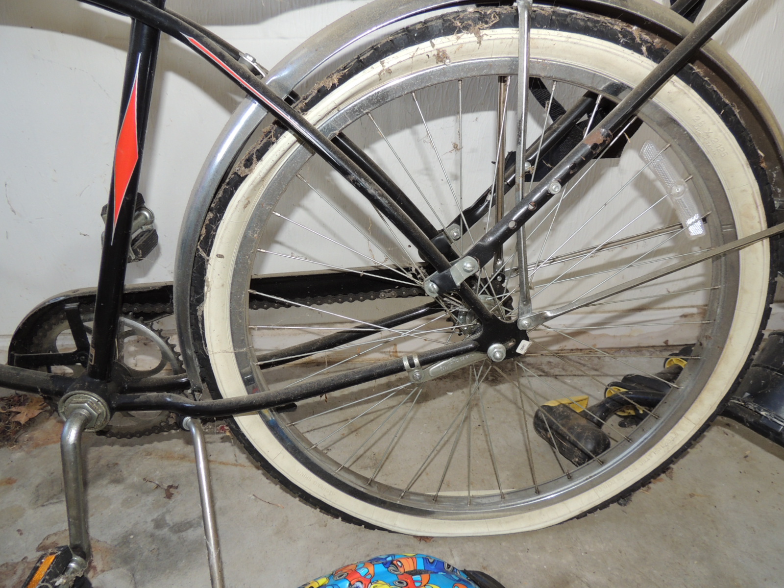 Two Cannondale Bicycles, a Schwinn Bicycle and Two Bike Racks