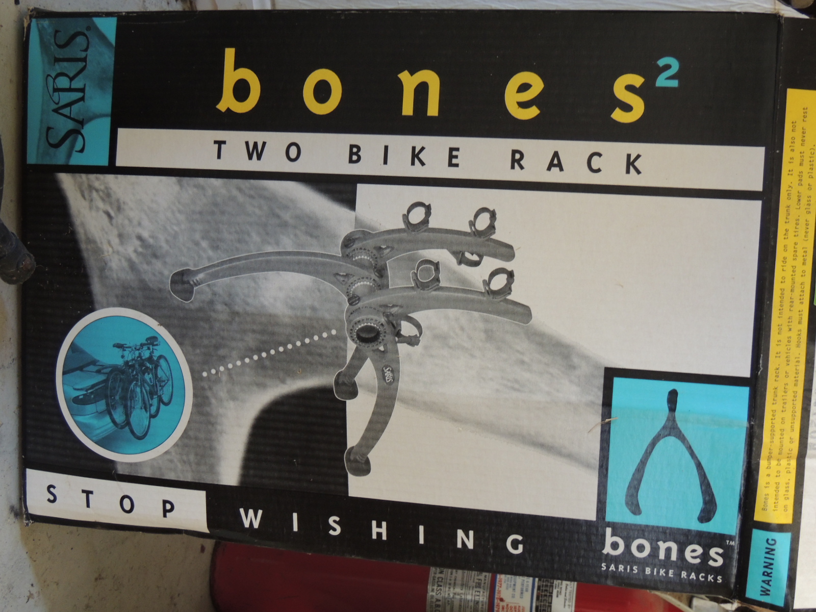 Two Cannondale Bicycles, a Schwinn Bicycle and Two Bike Racks