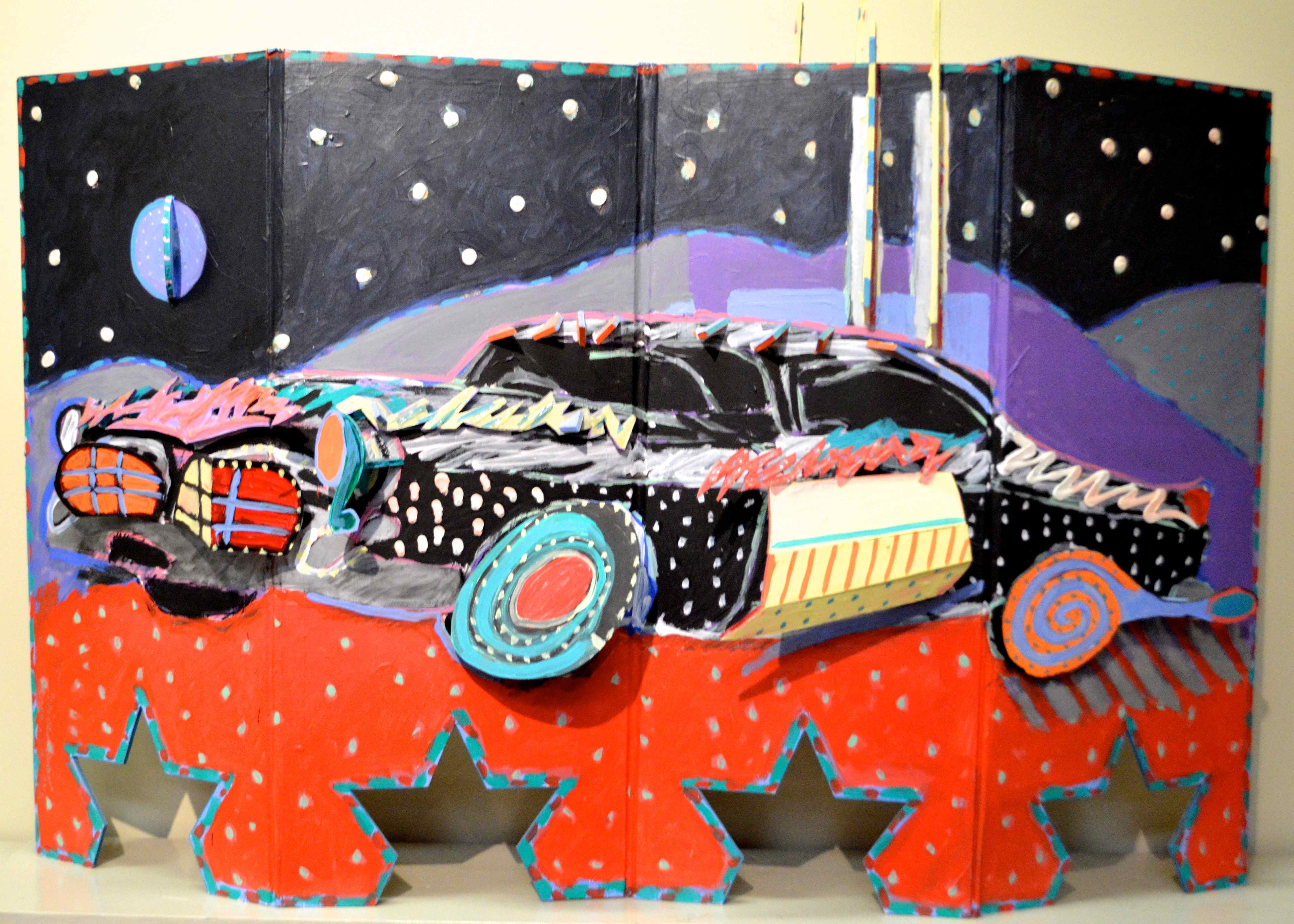 Three-Dimensional Reversible Art with Cut-Outs