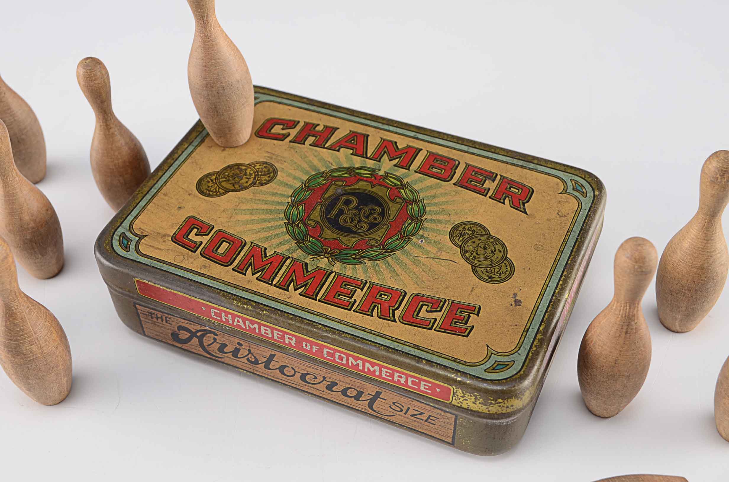 Small Vintage Wooden Bowling Pins in Tin