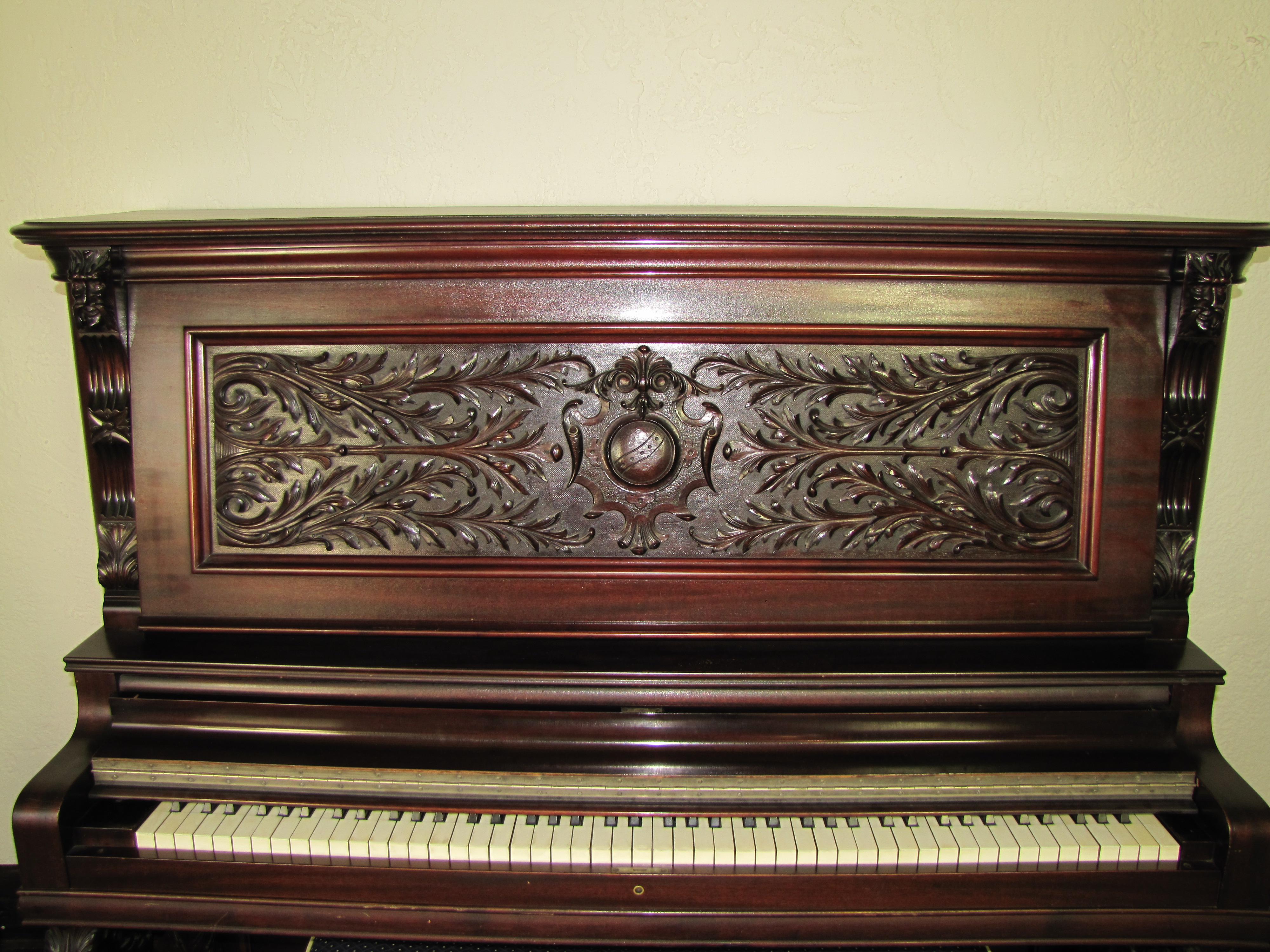 Victorian Wurlitzer Highly Carved Upright Piano  