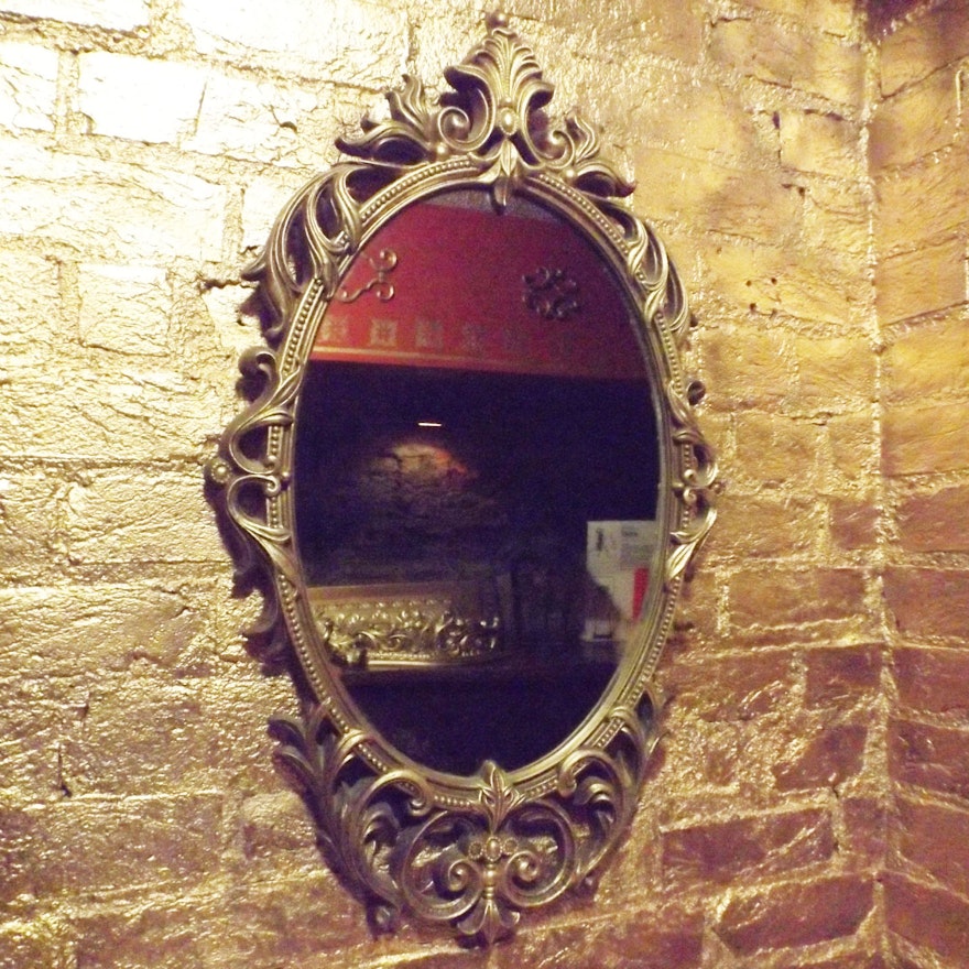 Ornate Gilt-Framed Mirror