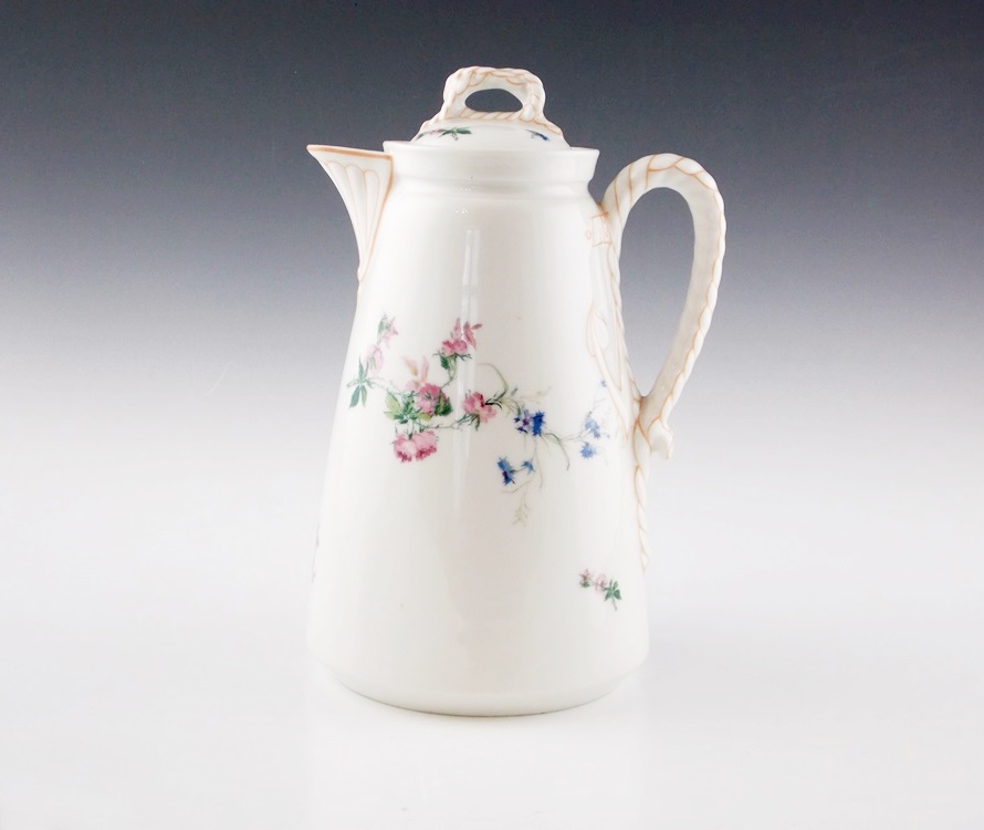 A Delightful Vintage Haviland Limoges Pitcher with a Rope Handle and Three Cups