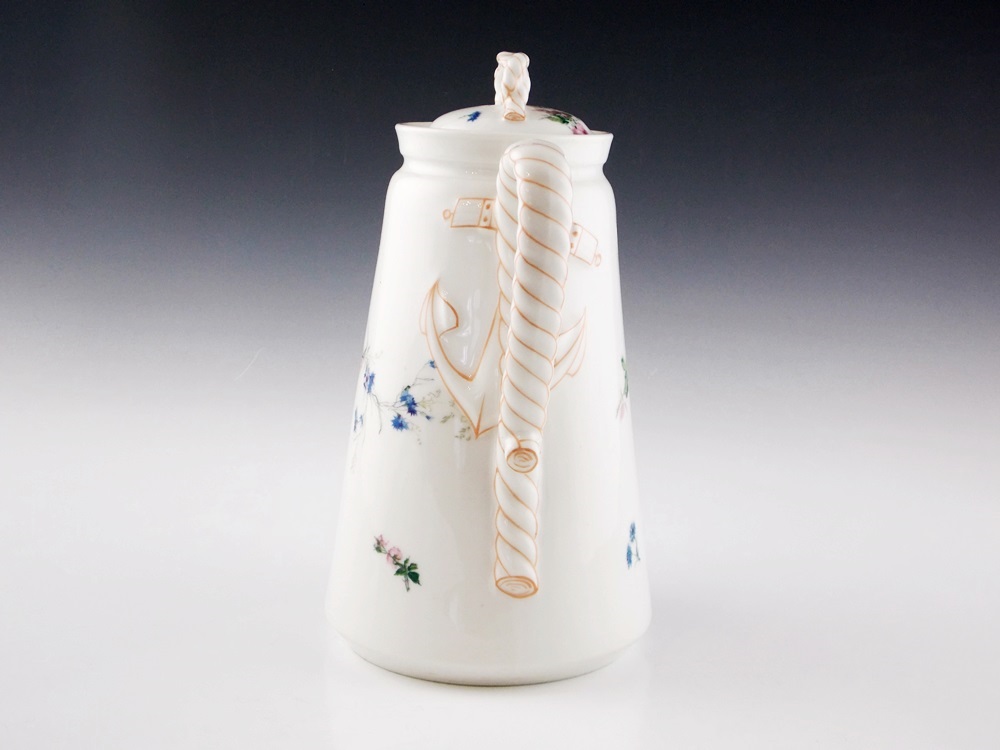 A Delightful Vintage Haviland Limoges Pitcher with a Rope Handle and Three Cups