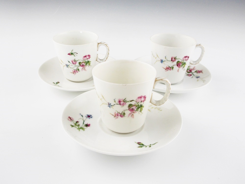 A Delightful Vintage Haviland Limoges Pitcher with a Rope Handle and Three Cups