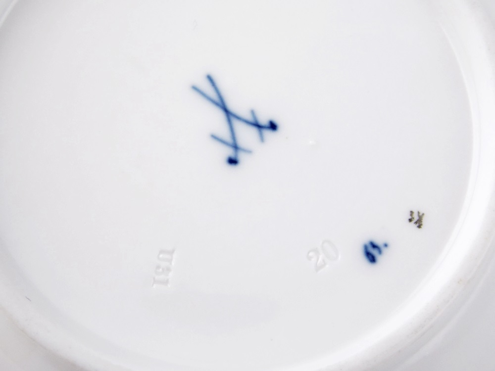 An Antique Meissen Tea Cup and Saucer in a Floral and Gold Pattern