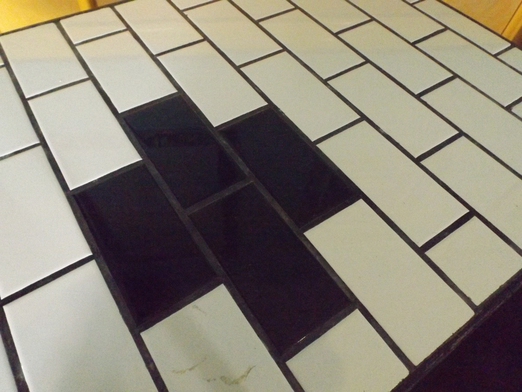 Black and White Tile Top Table