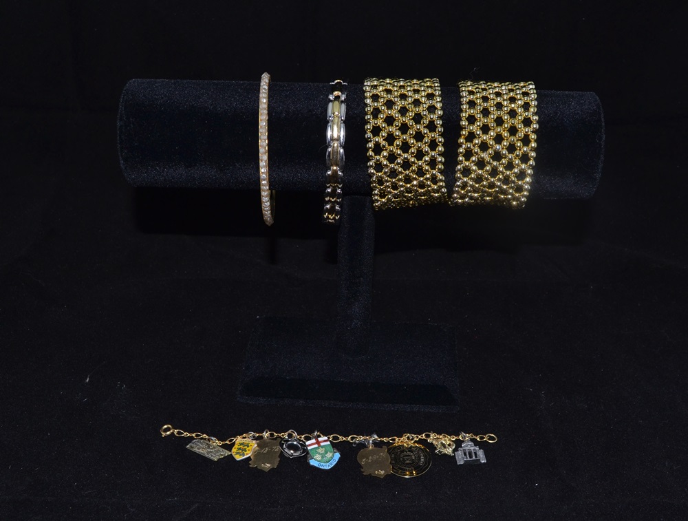 Five Gold Tone Bracelets