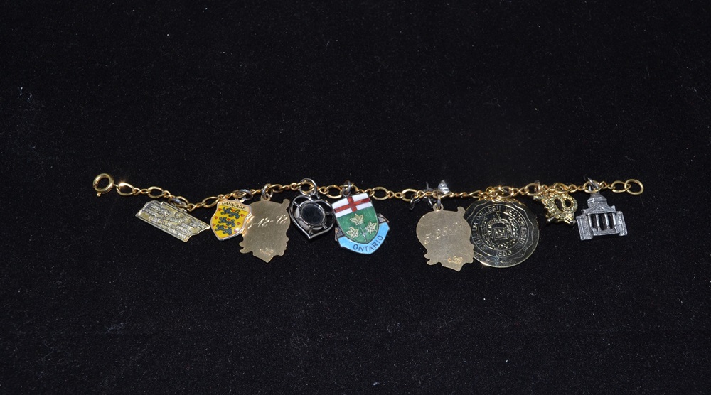 Five Gold Tone Bracelets