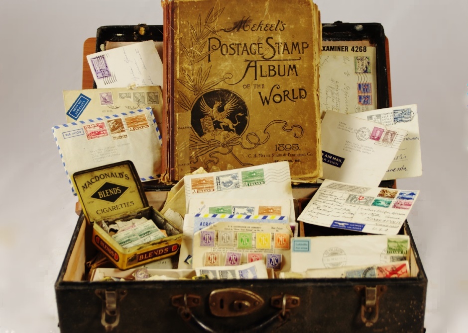1895 'MeKeel's Postage Stamp Album of the World' with Case of Stamps