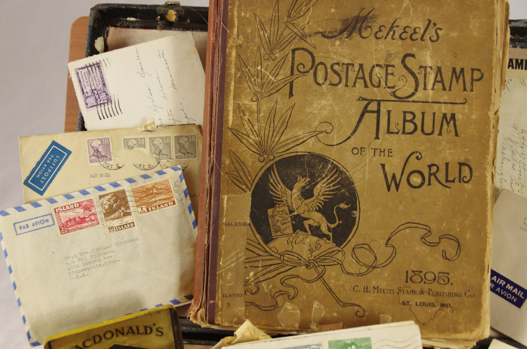 1895 'MeKeel's Postage Stamp Album of the World' with Case of Stamps