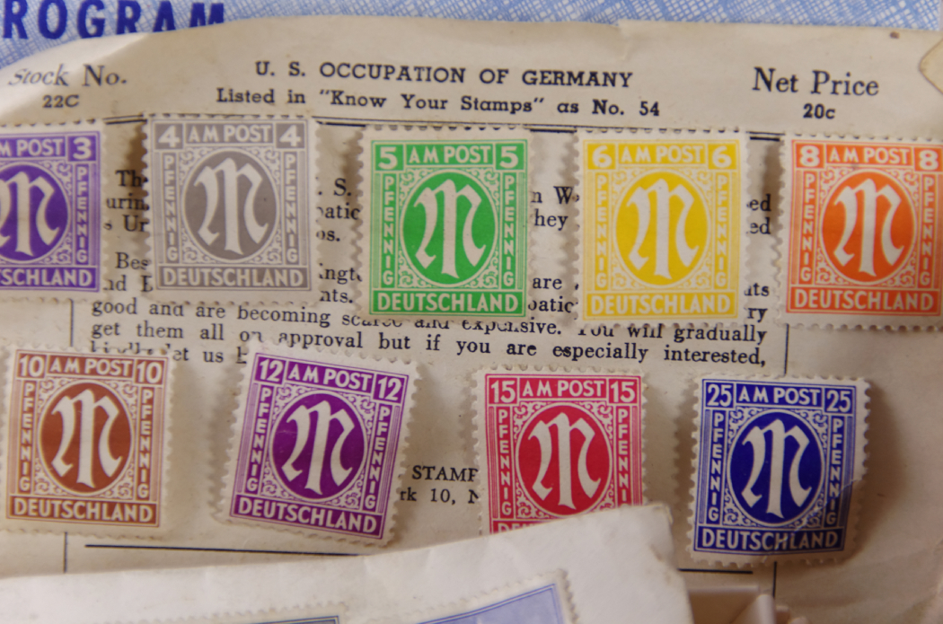 1895 'MeKeel's Postage Stamp Album of the World' with Case of Stamps