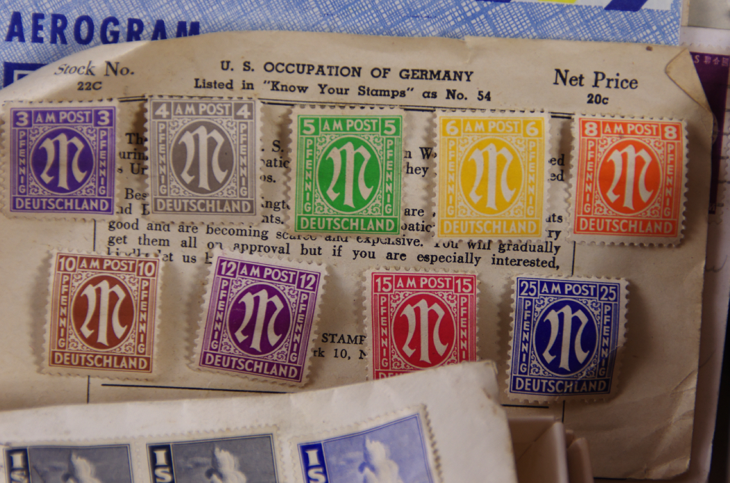 1895 'MeKeel's Postage Stamp Album of the World' with Case of Stamps