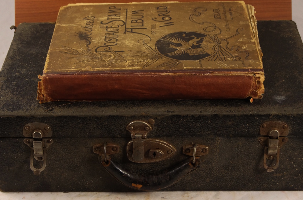 1895 'MeKeel's Postage Stamp Album of the World' with Case of Stamps