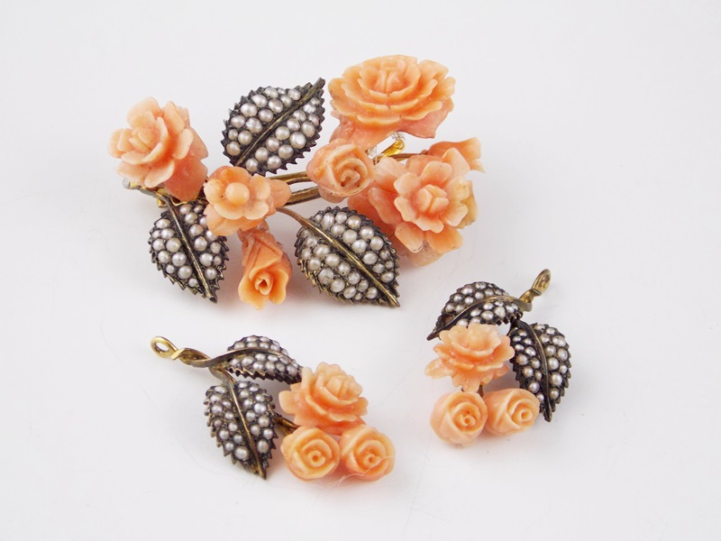 A Vintage Carved Coral and Seed Pearl Brooch & Two Pendants (Perhaps Earrings)
