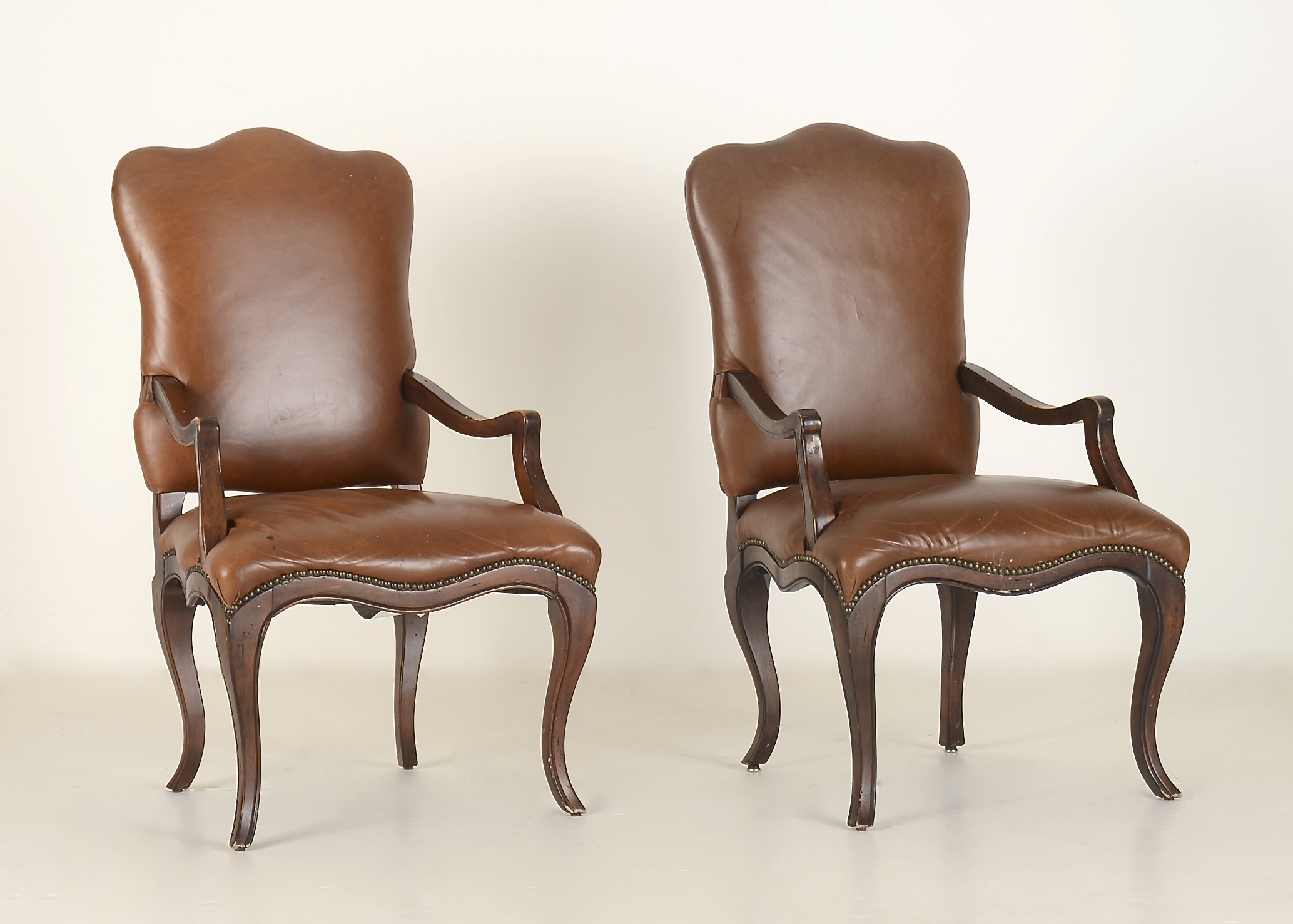 Pair of Vanguard Furniture Leather Couture Provincial Style Fauteuil Chairs