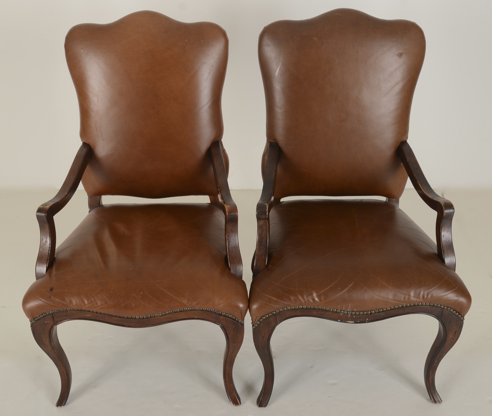 Pair of Vanguard Furniture Leather Couture Provincial Style Fauteuil Chairs