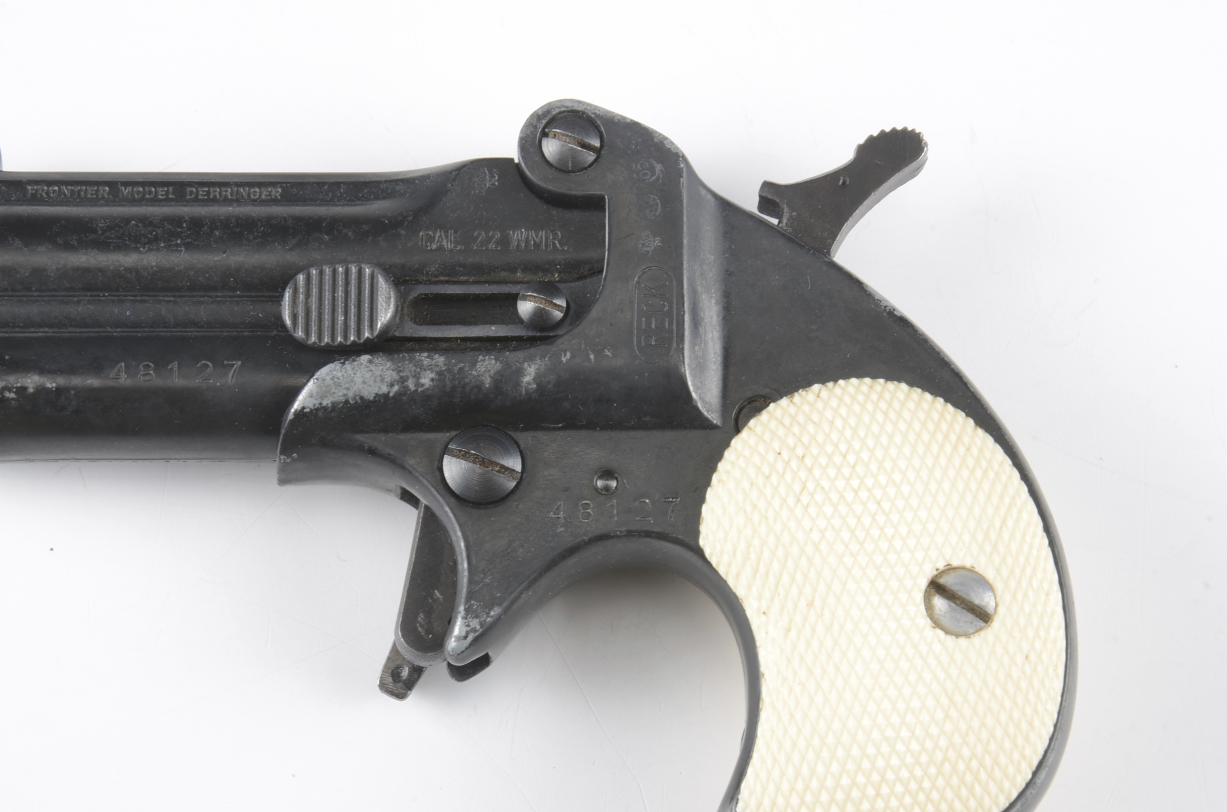 Frontier model Derringer made by Reck.  .22 caliber