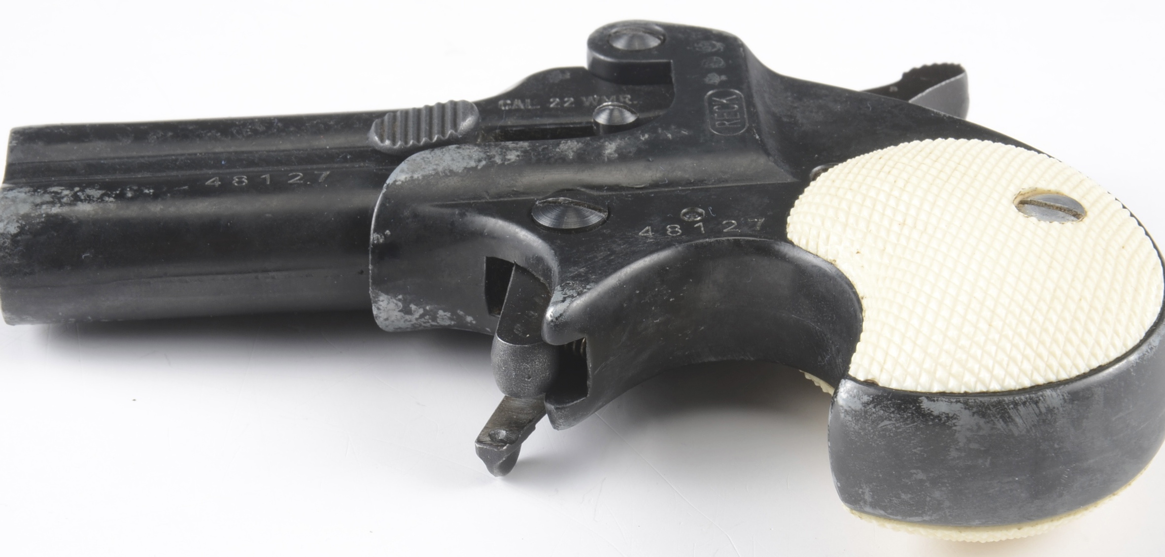 Frontier model Derringer made by Reck.  .22 caliber