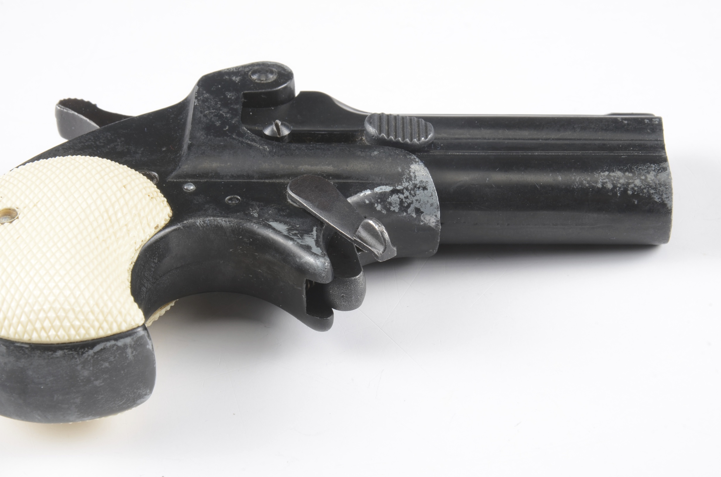 Frontier model Derringer made by Reck.  .22 caliber