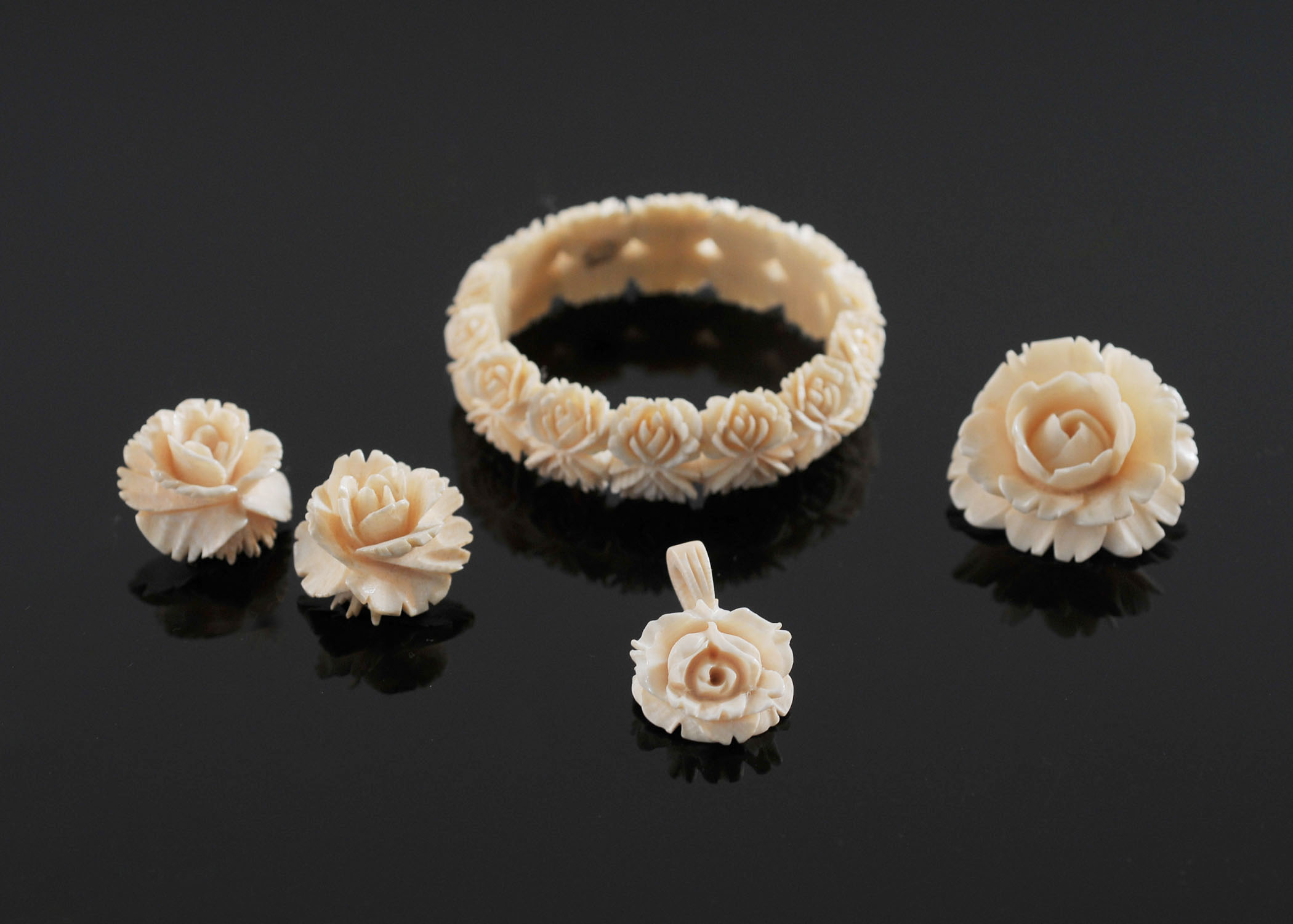 Carved Ivory Pendant, Bracelet, Earrings, and Pin