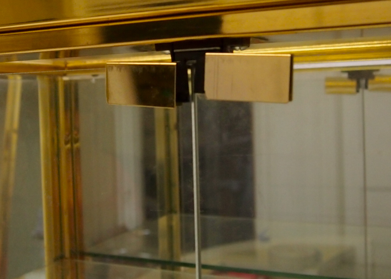 Gold Metal and Glass Display Cabinet and Mirror