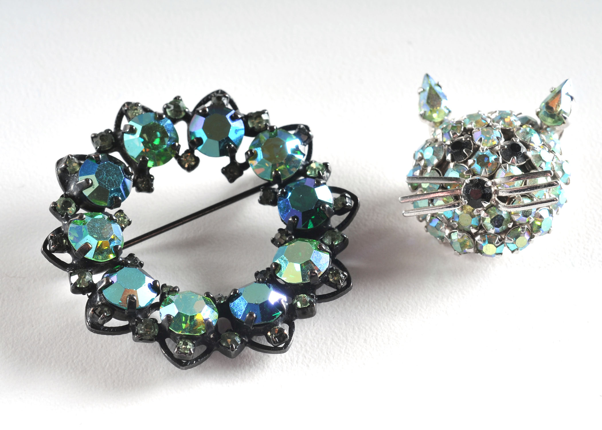 Two Vintage Joseph Warner Signed Brooches