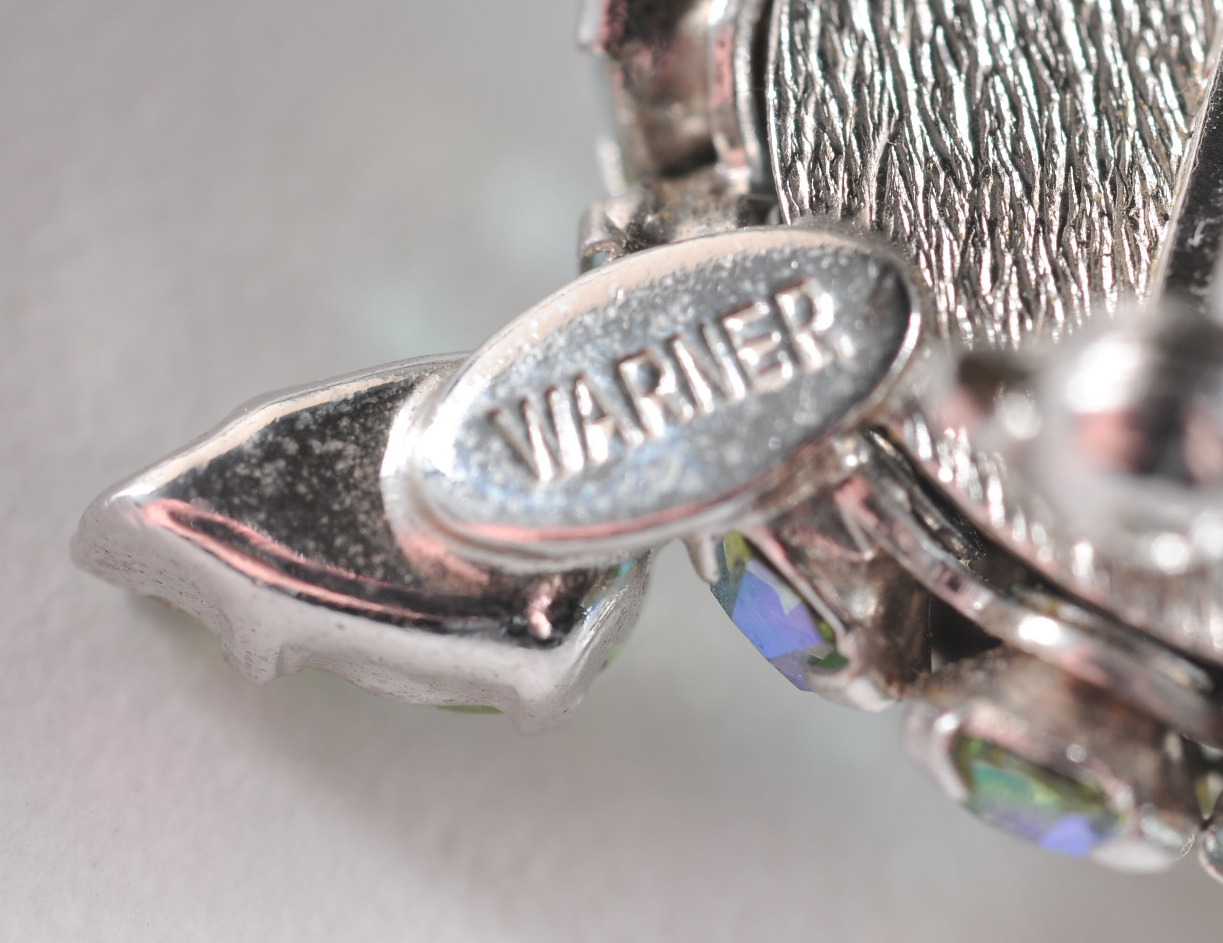 Two Vintage Joseph Warner Signed Brooches