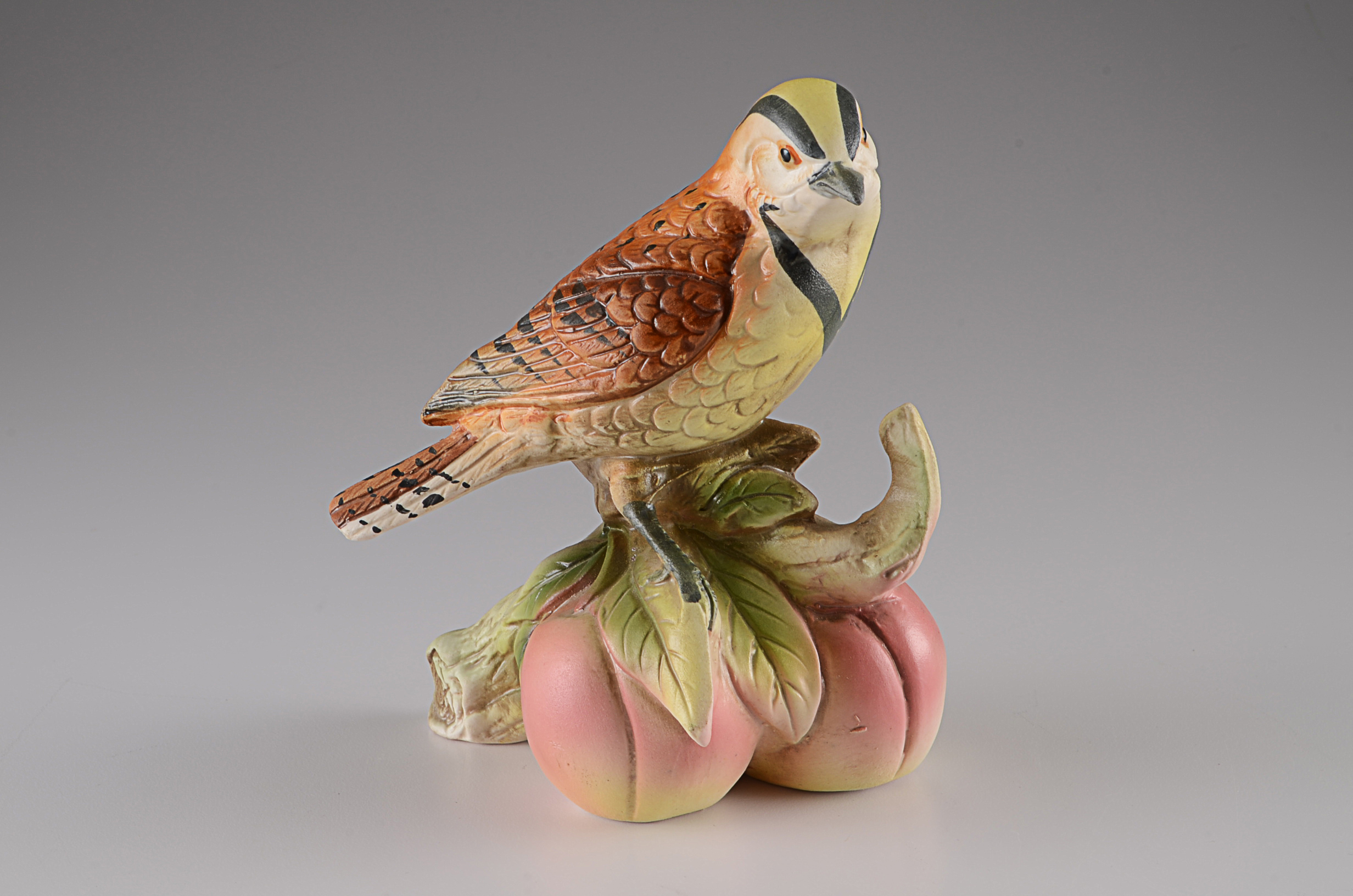 Decorative Plates and Bird Figure