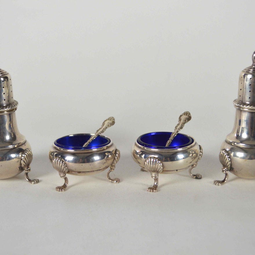 Pair of Salt Cellars and Footed Pepper Shakers 