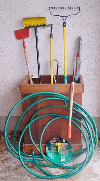 Wood Storage Bin on Casters With Garage Tools