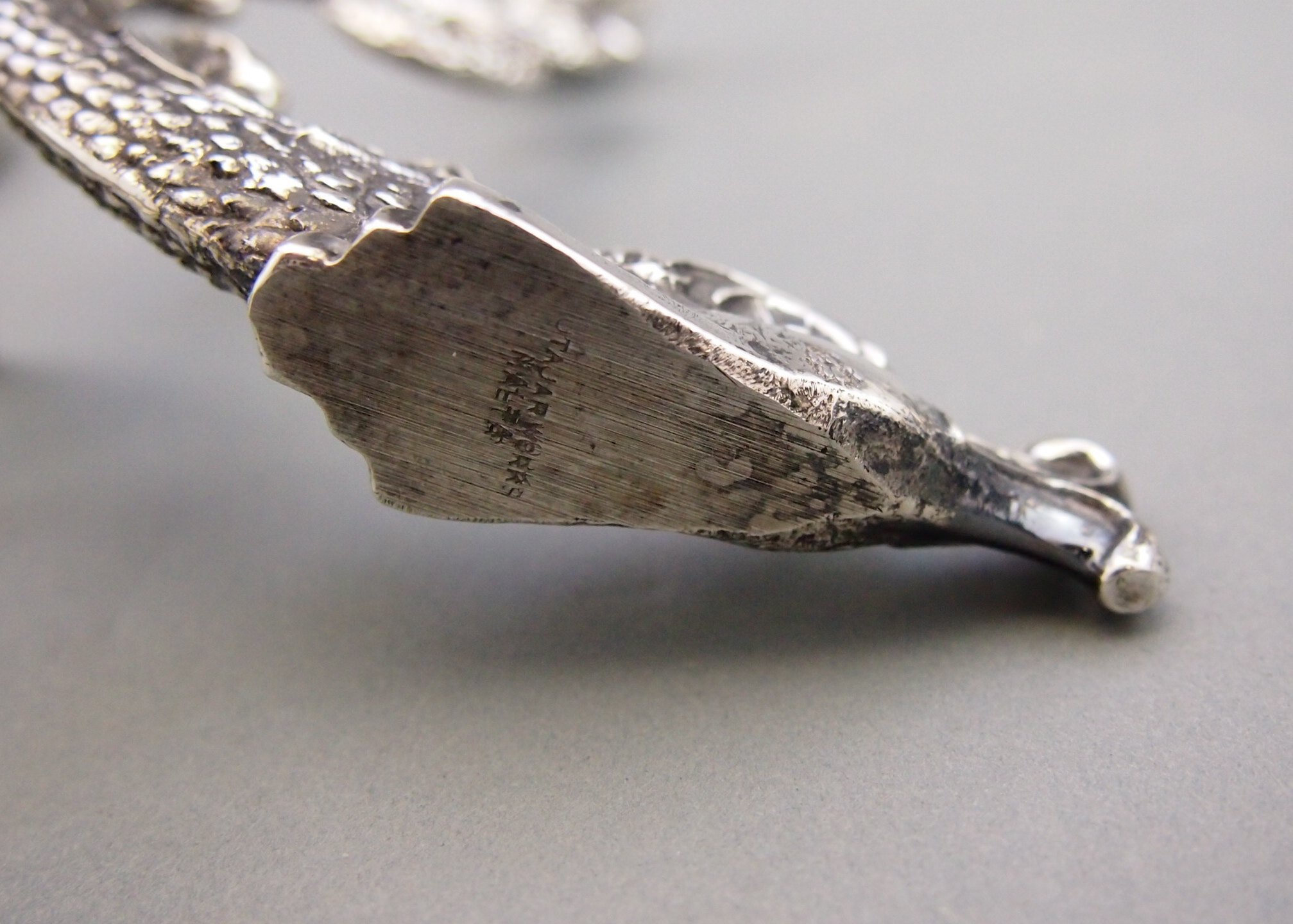 Two Modern Silver Colored Candle Holders