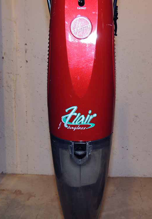 A Hoover "Flair" Bagless Stick Vacuum and OreckXL Portable Vacuum